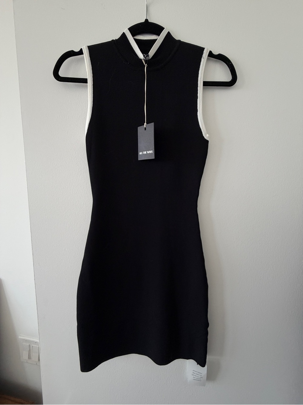 Sleeveless Black Mini Dress with White Trim